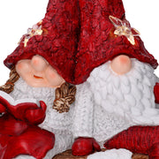 Babbo natale led resina con bimba rossocm40x26h15